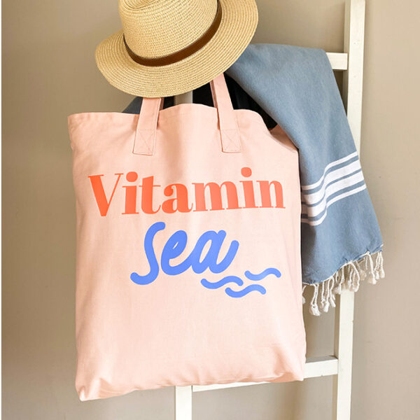 Strandtasche Vitamin sea . Tasche leicht rosa mit Aufdruck Vitamin sea